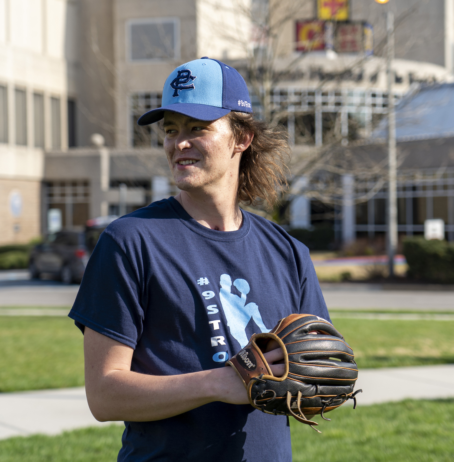 TR Williams throwing baseball again outside of Children's Hospital of The King's Daughters.